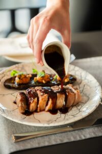 Best restaurants in Valletta Malta outdoor dining on a historic street at night